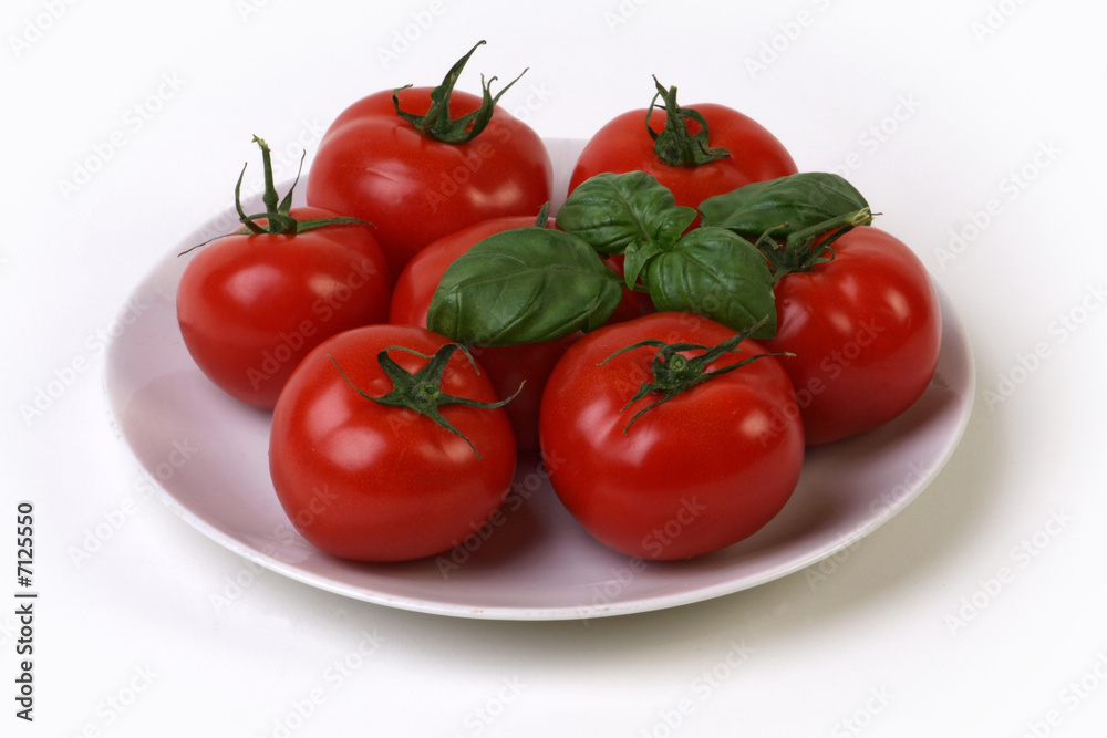 Plate with tomatoes and basil