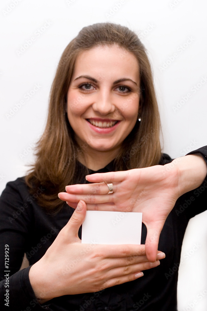 Portrait of a beautiful businesswoman holding a blank card. Portrait of a beautiful businesswoman holding a blank card.