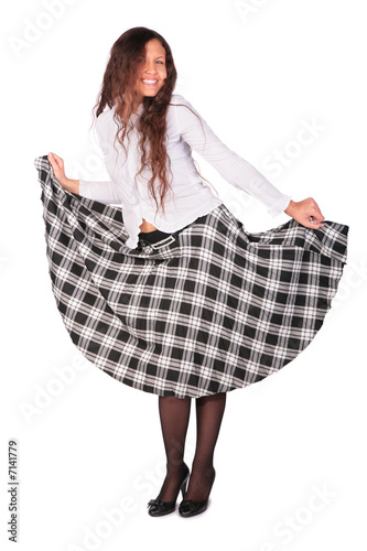 Fotografie young pretty girl in squared petticoat