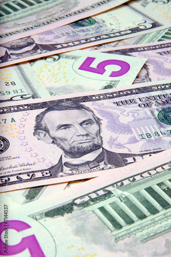 Pile of US $5 bills