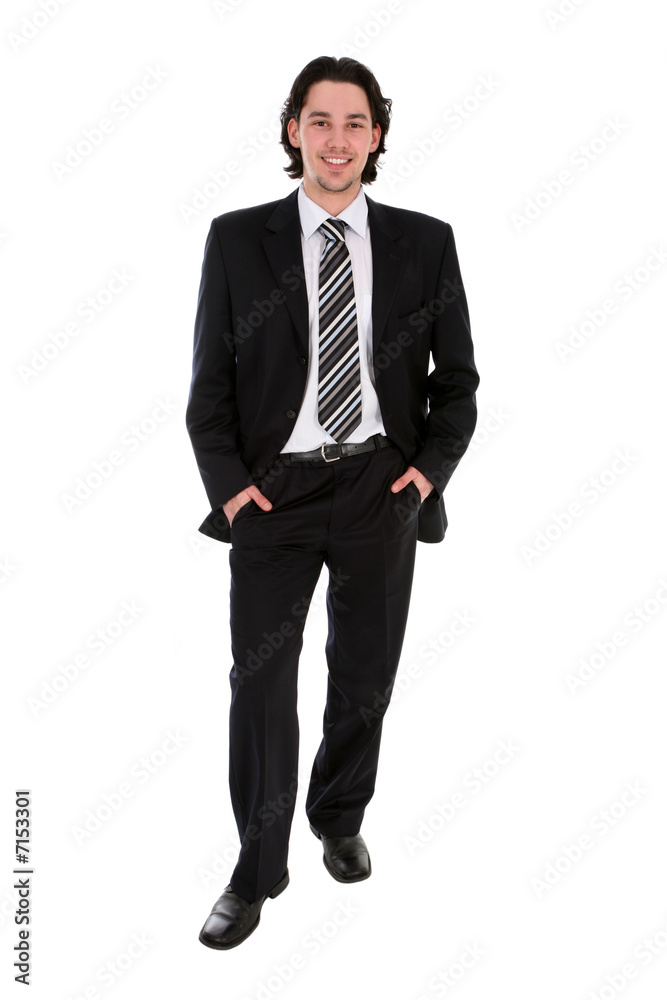 Businessman standing with hands in pockets Businessman standing with hands in pockets