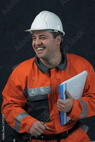 smiling mine worker with file