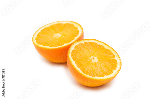 Two half-cut oranges isolated on white background