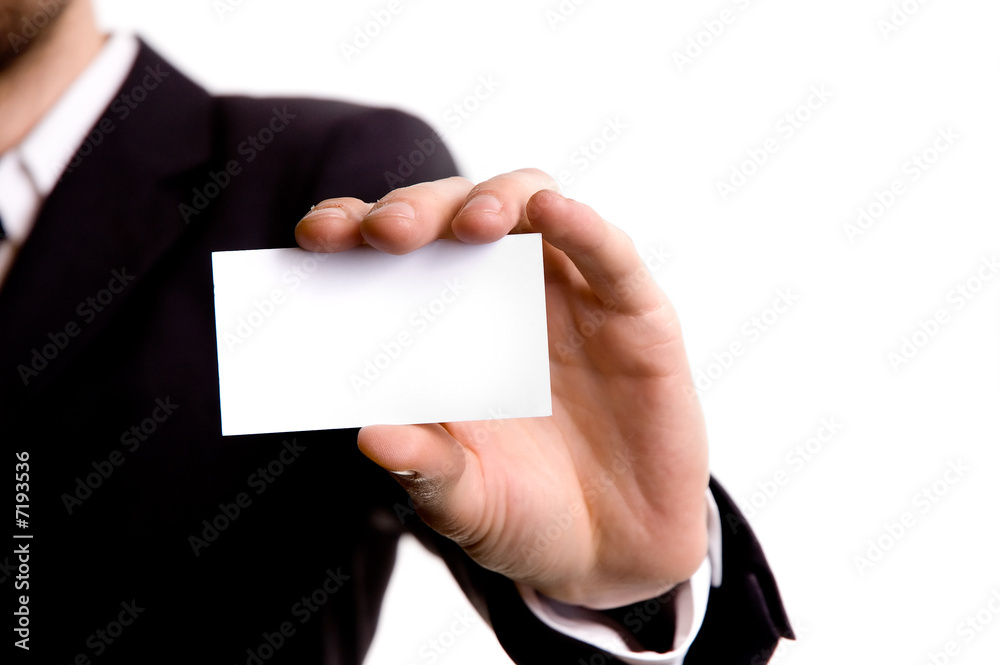 Businessman holding a blank business card Businessman holding a blank business card