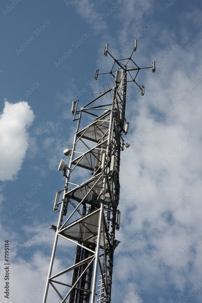 antenna tower and a cloudy sky