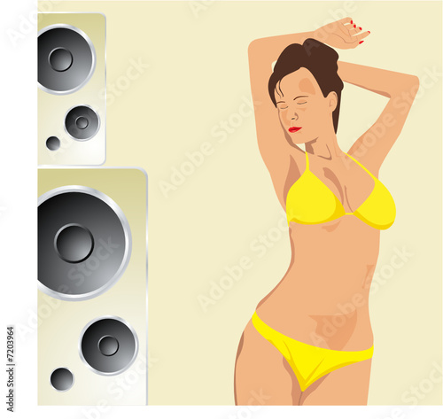 Sexy woman dancing against a background of speakers