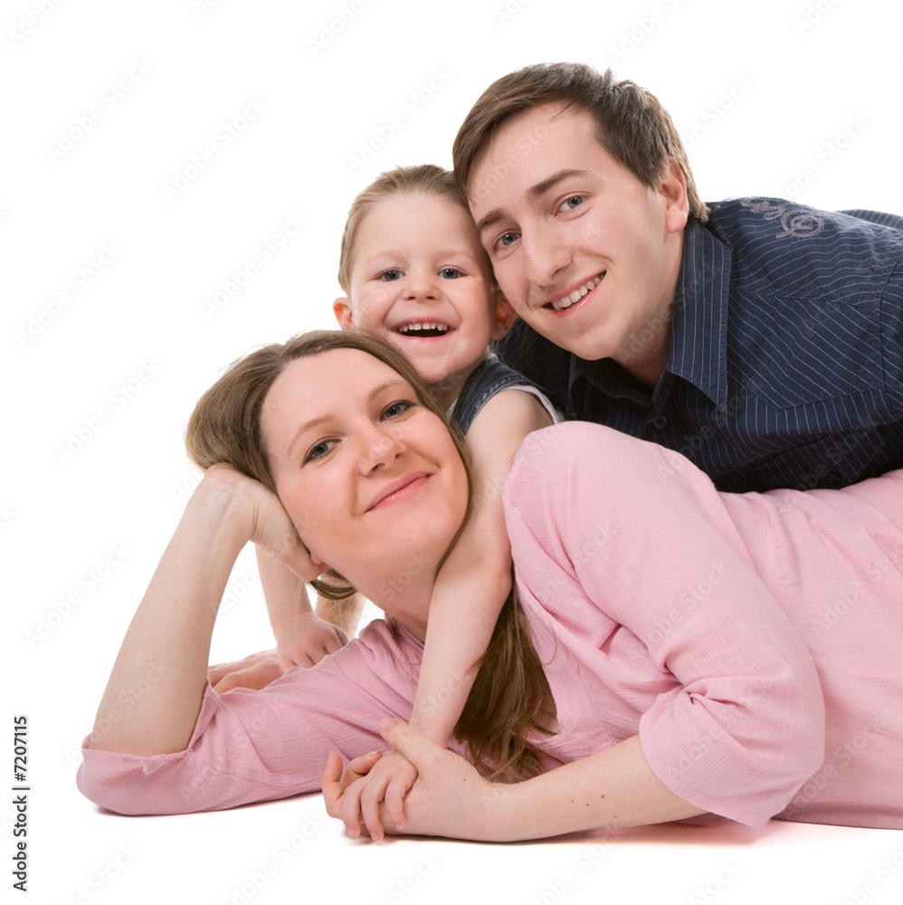 Casual portrait of happy young family