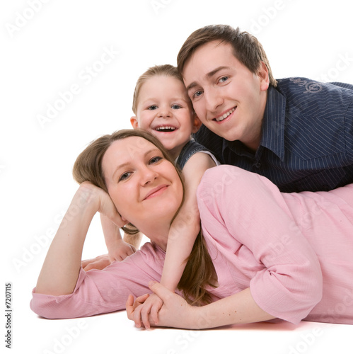 Casual portrait of happy young family