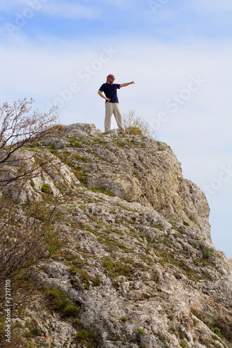 Active people - Person climbing a cliff