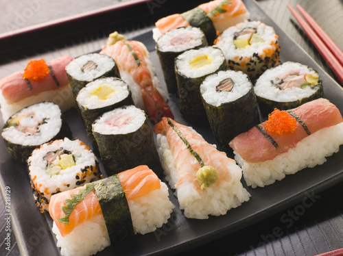 Selection of Seafood and Vegetable Sushi on a Tray with chopstic