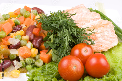 Stake from a salmon with vegetables