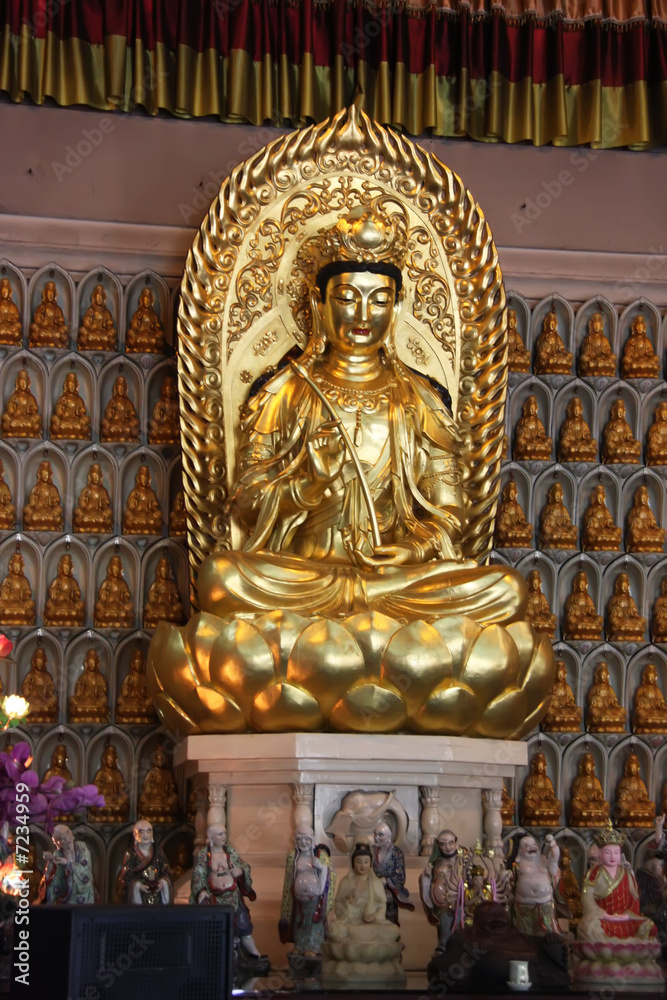 Golden statue of Kuan Yin godess of mercy
