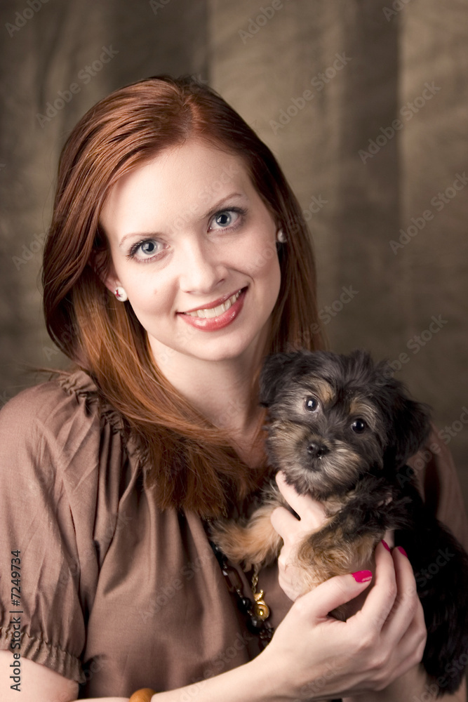 Attractive Young Woman and Her Adorable Yorki-poo Attractive Young Woman and Her Adorable Yorki-poo