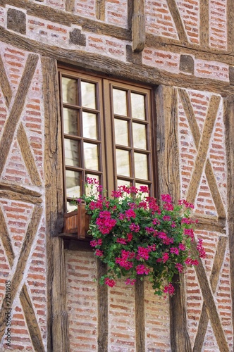 windows of half-timbered house, Ambois, France photo