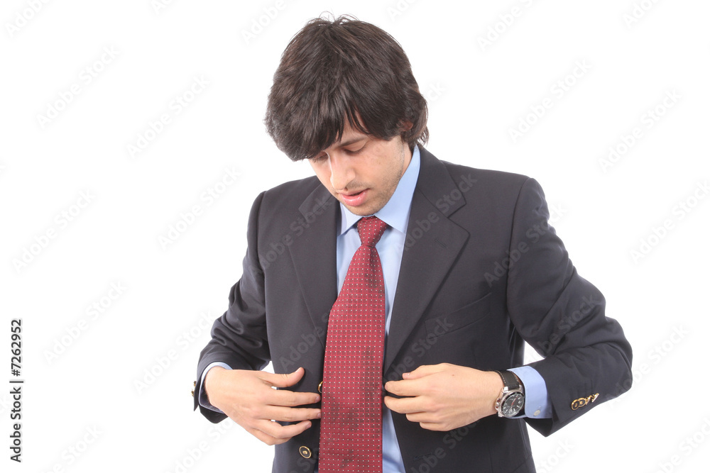 Young business man worried, about his dirty tie Young business man worried, about his dirty tie
