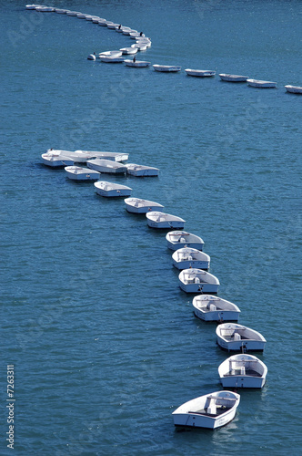White boats on blue sea