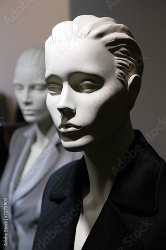 two mannequins in jackets