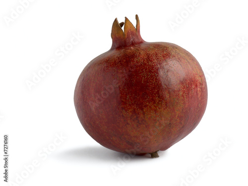 Red pomegranate on a white background