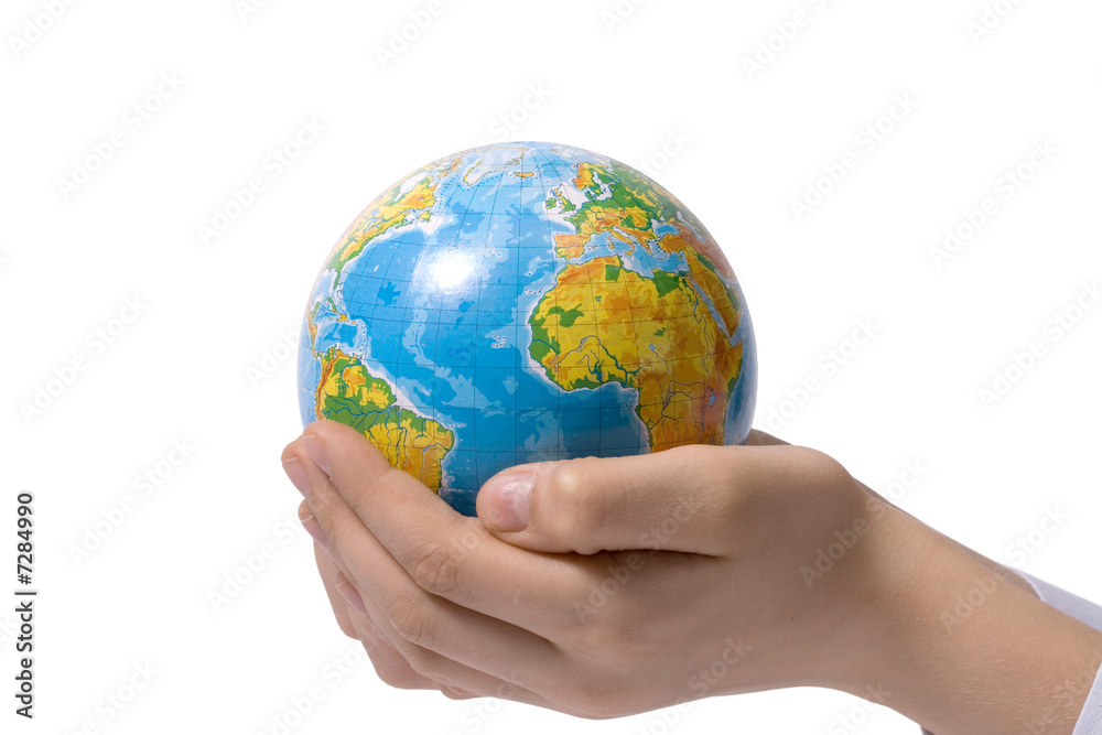 The globe in children's hands The globe in children's hands