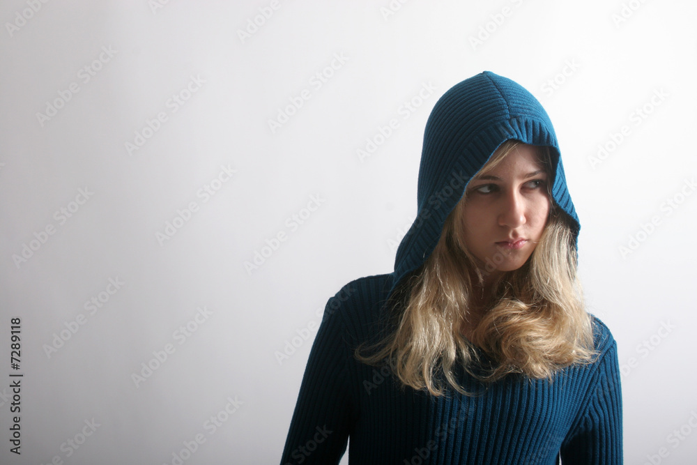 Lovely blond in hood looking right