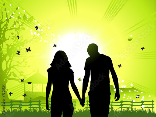 Happy couple walks on nature, sunset