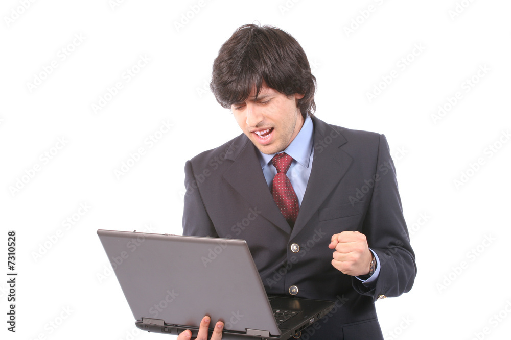 Young happy business man working with laptop Young happy business man working with laptop