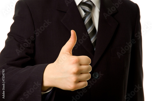 Thumbs up. Businessman shownig everything is OK.