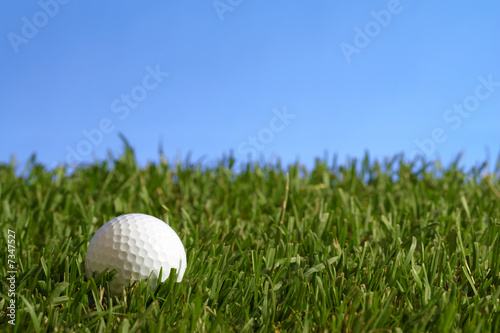 golfball at blue sky