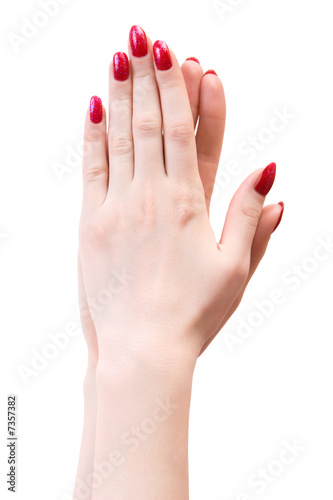 Two woman hands pressed palms to each other