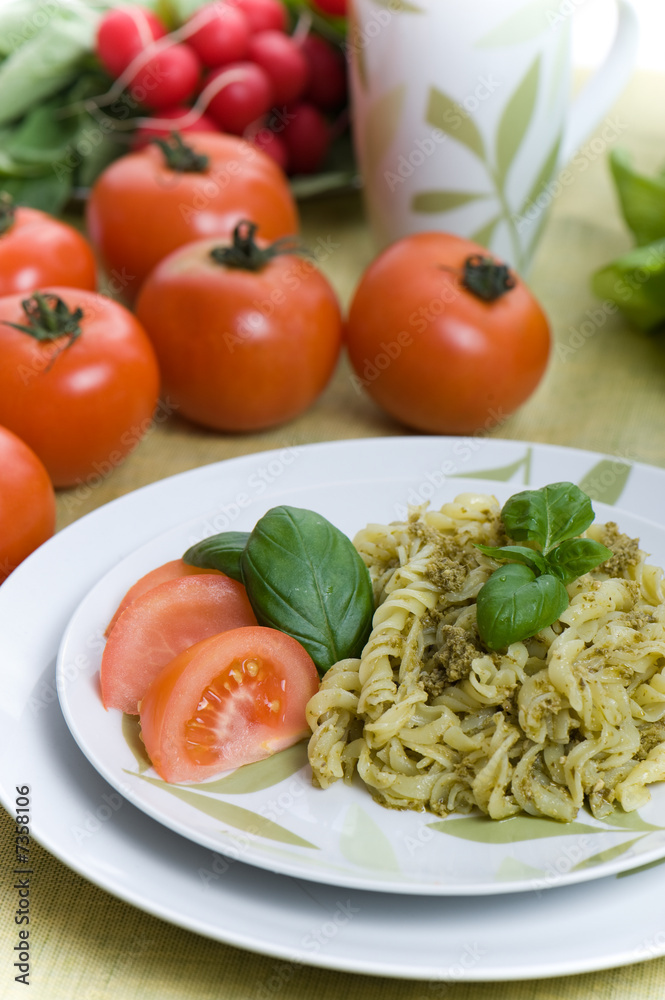 Spaghetti with pesto sauce and cheese Spaghetti with pesto sauce and cheese
