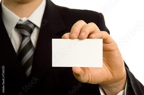 Businessman showing a blank business card