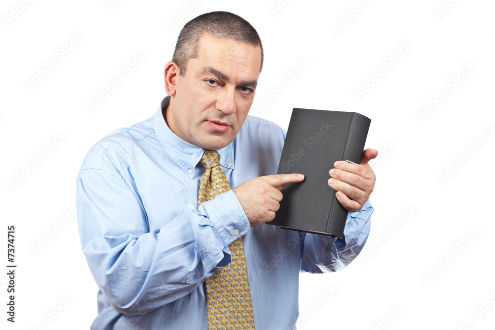 Business man holding a book Business man holding a book