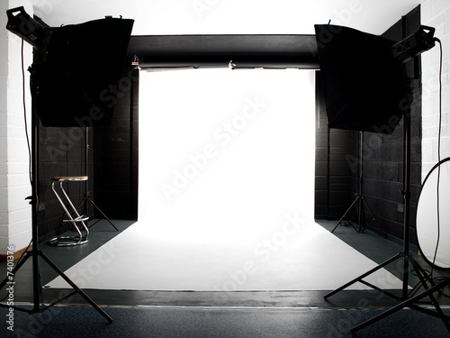 Empty studio with lights and white background