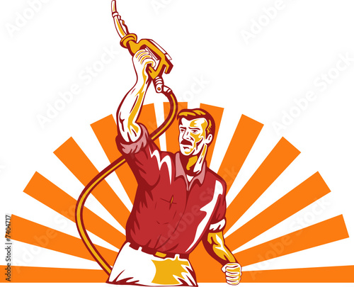 Man raising a gasoline pump nozzle
