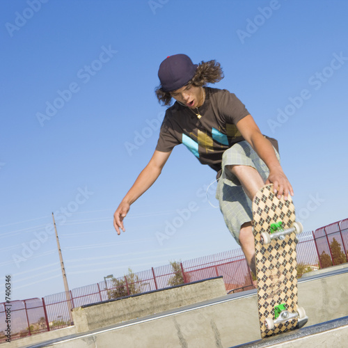 Skateboard tricks at a skateboard park