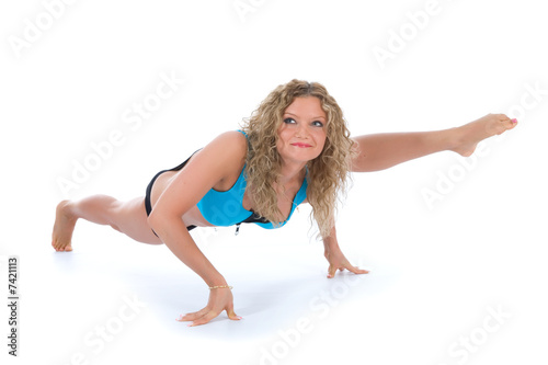 Girl practicing fitness © Guy Shapira