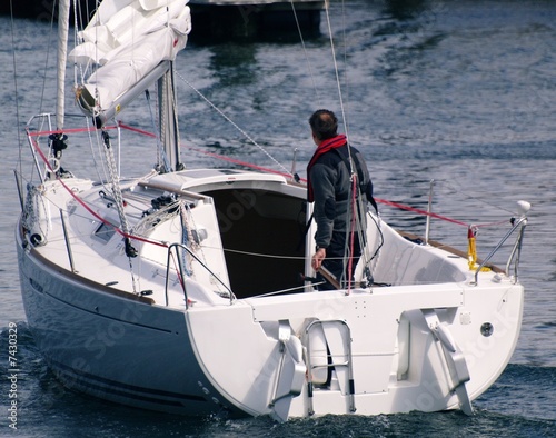 at the helm