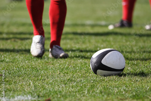 Rugby ball on the playing field.