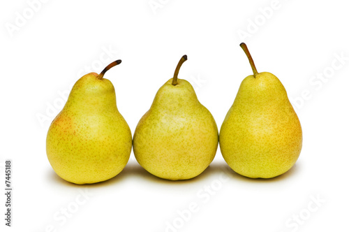 Three yellow pears isolated on the white