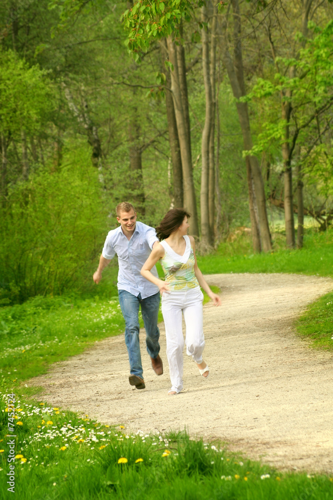 young couple is playing tag