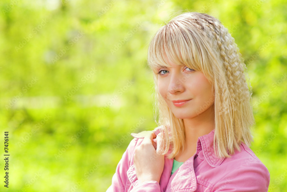 Beautiful young woman outdoors