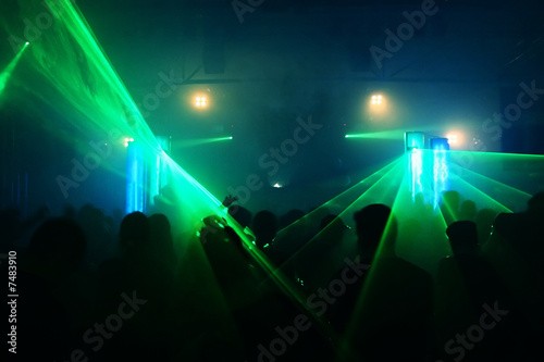 Dancing people in an underground club