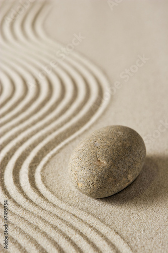 Stone on raked sand