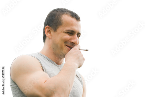 Young man Man smoking isolated on white background