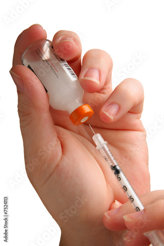 Syringe with vial isolated on white