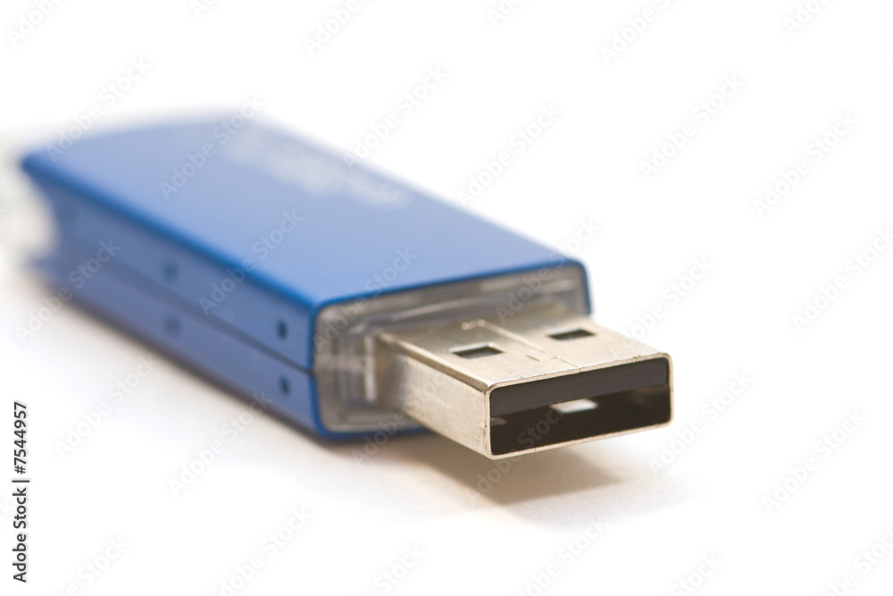 an usb-stick for the computer on a white surface an usb-stick for the computer on a white surface