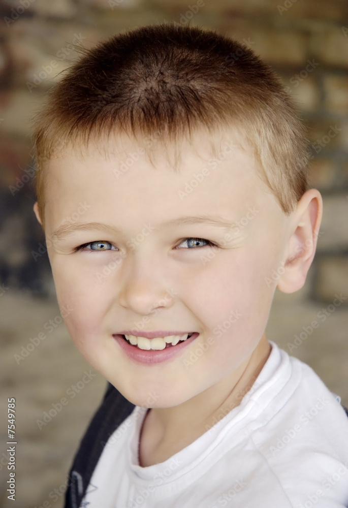 A happy smiling 8 year old boy. A happy smiling 8 year old boy.