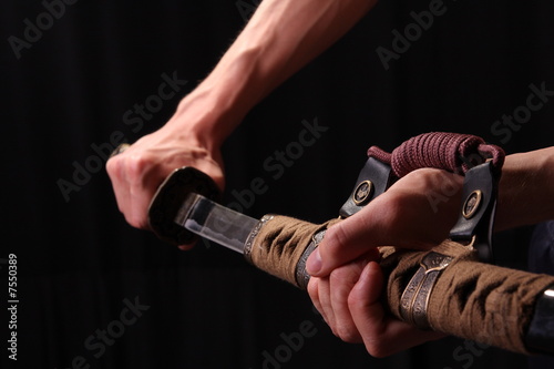 Man holding samurai sword