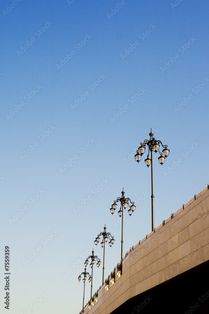 Several lamp posts on sky background Several lamp posts on sky background