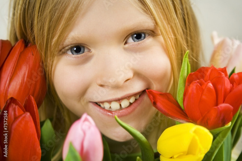 Girl and tulps photo